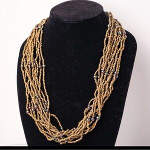 Multiple strands of Gorgeous Beads Gold and Black Beaded layered Necklace